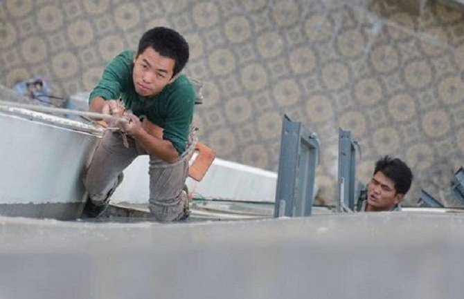 Kina: Dječak presjekao uže visinskom radniku